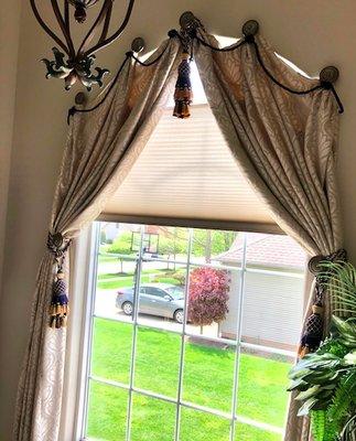 Arched window treatments.