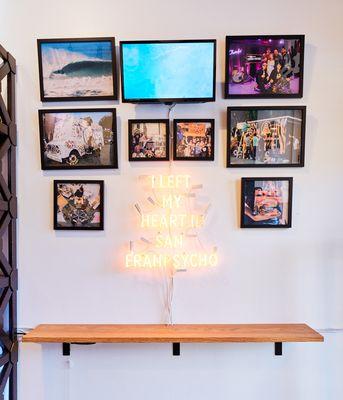 San Franpsycho Neon Sign and story wall.