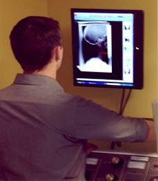 Dr. Damron reviews patient x ray.