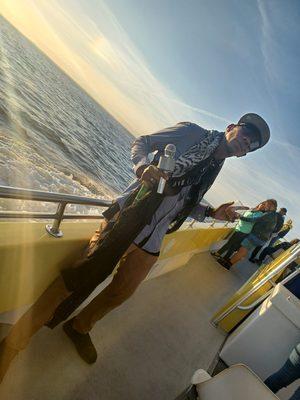 Cheffy Jhea giving riders of the sunset dolphin cruise in FL a show.