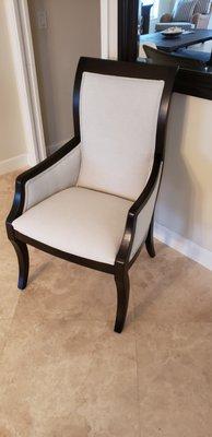 After
 Refinished and upholstered arm dining chair.