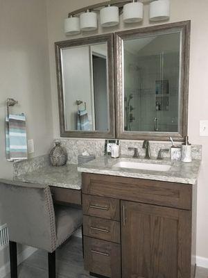 Custom built vanity with Quartz top as well as custom under-mount sink.