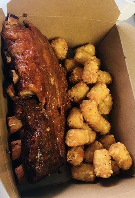 Half rack of baby back ribs and tots