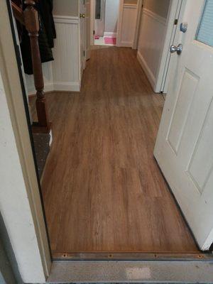 Open doors into new laminate installed. Free estimates , quality installation , modern design.