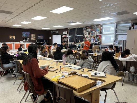 Lopez teaching underclassmen, magnet Photography