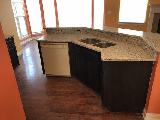 Refinished existing maple cabinets with new stain and 
Finish