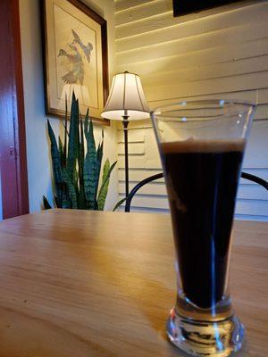 Small pour of Casita Brewing Company's Pumpkin Prince porter. $4