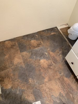 luxury Vinyl Plank flooring install in bathroom.