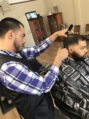 Daniel "D" Beginning a Razor Fade