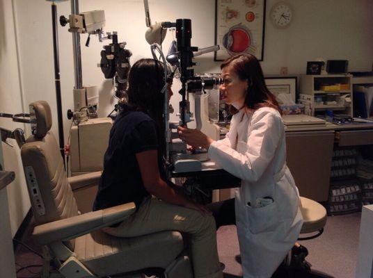 Slit lamp examination - checking this patient's eye health