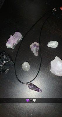 Amethyst, obsidian, pink calcite, white howlite, clear quarts skull and an amethyst pendant