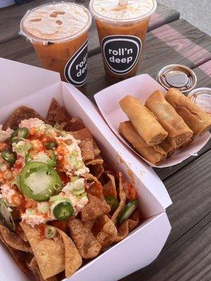 Crab Rangoon nachos, Fried spring rolls, Thai Tea