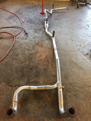 Custom fabricated and welded exhaust system for a 1964 GMC Suburban