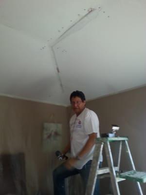 Dry wall repair. Reinforcing the ceiling while protecting the walls