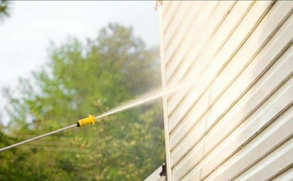 Power washing houses and decks and sheads