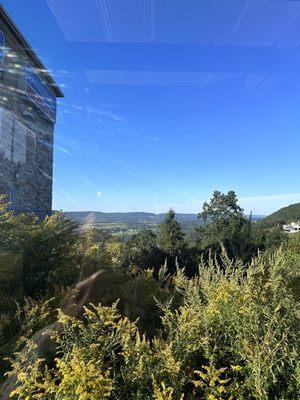 View of valley from screened in porch.