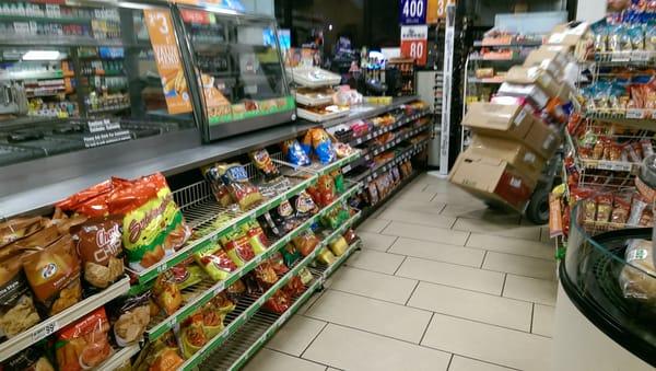 Inside 7-Eleven, near the register