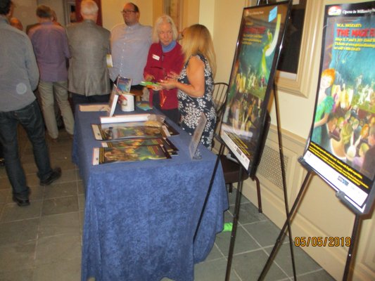 Opera in Williamsburg: In the Kimball Theatre Lobby, selling posters on the right.