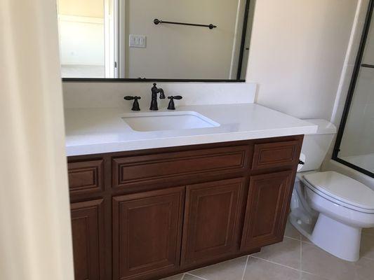 The rectangular sink and the quartz top turn out beautiful!