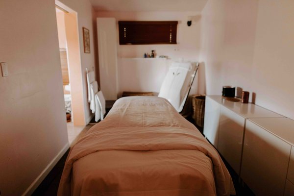 Our custom built treatment space features an herbal steam and far infrared heated treatment table.