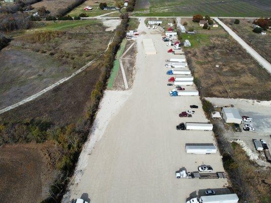 1.5 acre detention pond with a sloped grade to preven flooding and water puddles