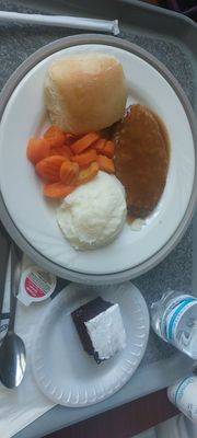 Salisbury steak, mashed potatoes and chocolate cake