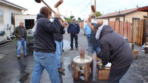 Mochitsuki - pounding of sweet rice.  Carrying on an ancient tradition of hand making rice cakes.