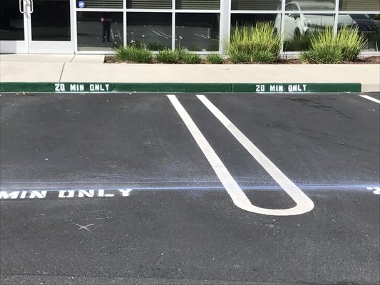 Antioch business stripes green curb with numbers for 20 minute parking