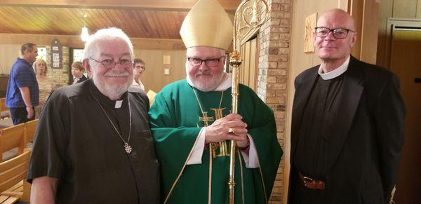 Fr. John Groff, The Rt. Rev'd Steven Andrew Miller, Episcopal Bishop of Milwaukee, and Fr. Julian V. Hills.