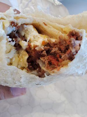 Eggs, potatoes, tri tip, chorizo and cheese breakfast burrito.