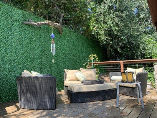 Grasstik fencing along existing chain link on upper pool deck. providing privacy and is pretty to look at!