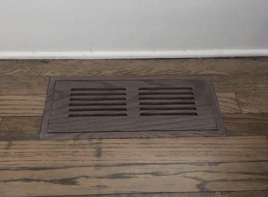 Custom hardwood vent cover