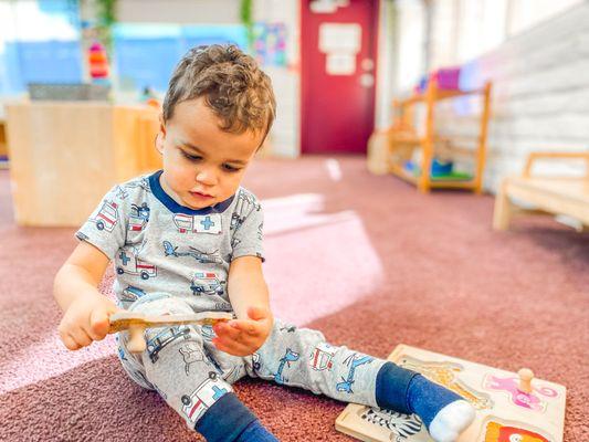 Infant room - he loves this activity!