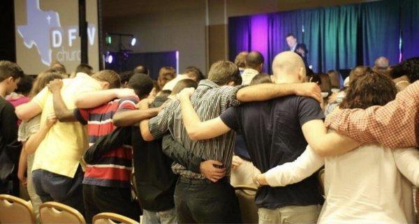 Disciples of Christ praying together.