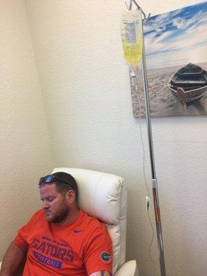 Relaxing during his IV therapy.