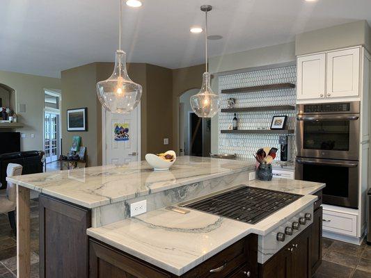 Island with flush mount cooktop! Quartzite wholes drilled for my cooktop knobs.