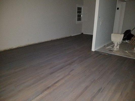 Darkened grey on red oak no finish stain only.