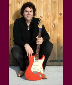 Bob Wolfman in front of his old barn door, for his CD release "The HOWL" ©2007.