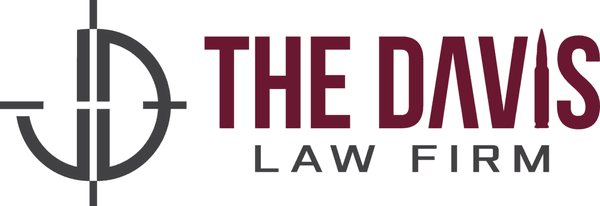 The Davis Law Firm Logo. Attorney Jason Davis's initials form a scope reticle logo, and the letter I in the name is a .50 Caliber cartridge.