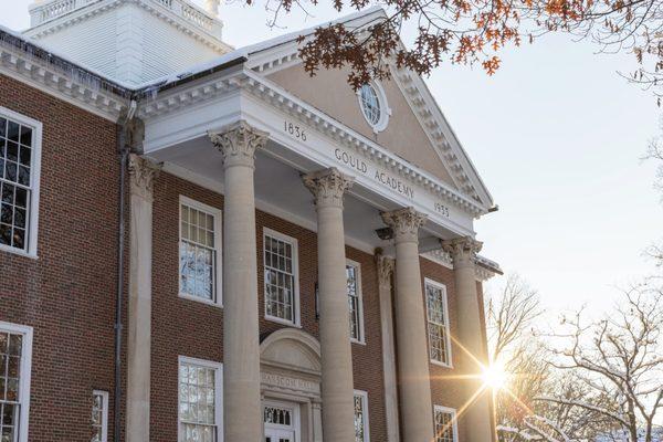 Hanscom Hall, the main academic building at Gould Academy in the winter.