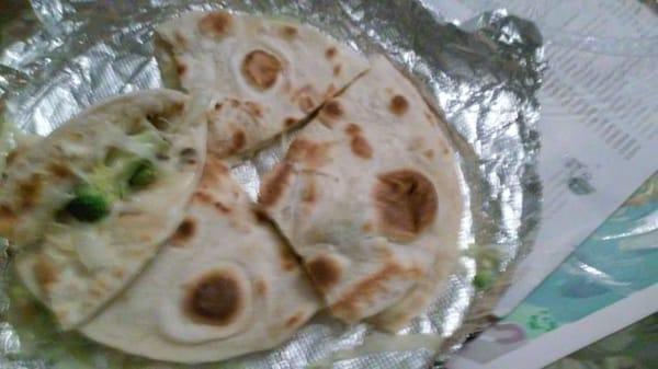 Vegetable Quesadilla.  Comes with sour cream and salsa.