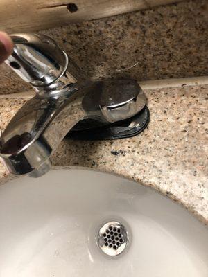 This is the faucet barely attached which made no sense to it