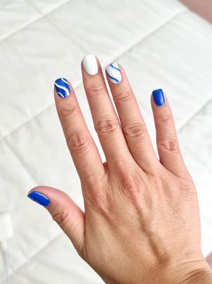 Blue and white gel design manicure