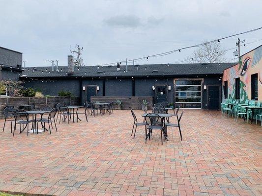 Back patio area of the coffee shop and commune