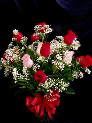 Dozen pink and red roses for someone you love.