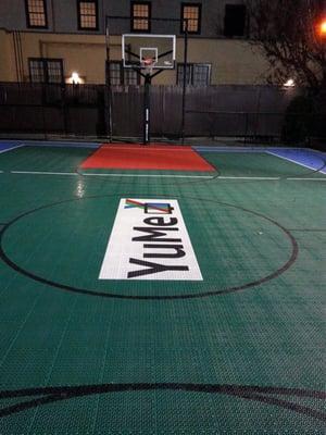 Half court line logo at night.