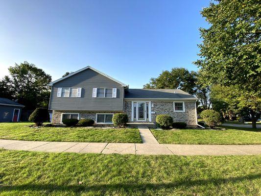 New Brick Veneer siding installation