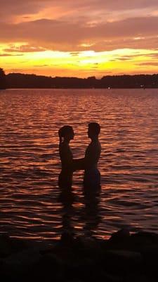 Two lovers at a Summer Sunset