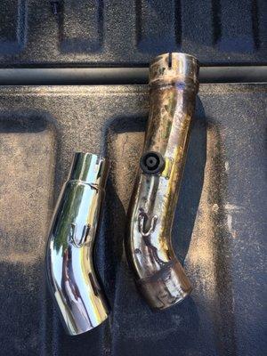 New GSXR750 tailpipe vs. the old Yamaha tailpipe. Just what I needed to get that muffler onto the Suzuki.