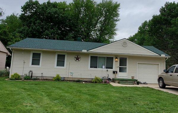 This customer really wanted green shingles and they were so happy with the finished project